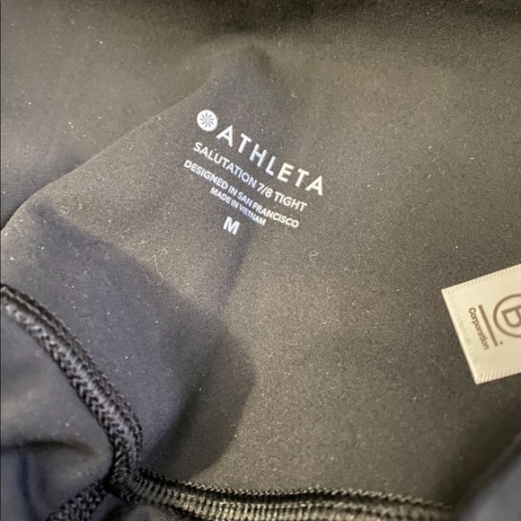 🆕ATHLETA Salutation Stash Pocket 7/8 Tight black leggings #531321 new with tags - Picture 5 of 12